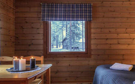 Doppelzimmer in einer Blockhütte