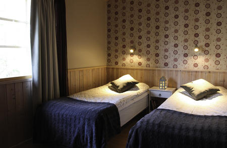 Doppelzimmer im Hotel Isokenkäisten Klubi