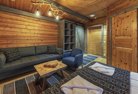 Doppelzimmer Wilderness im modernen Stil mit Sofaecke