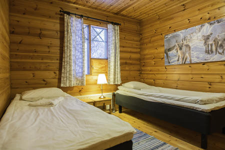 Schlafzimmer in der Blockhütte in Torassieppi